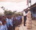 Rev. Bah addresses students of Dominion Christian Academy